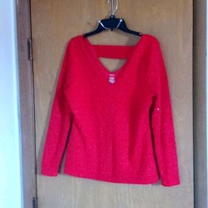 Red Jennifer Lopez sweater